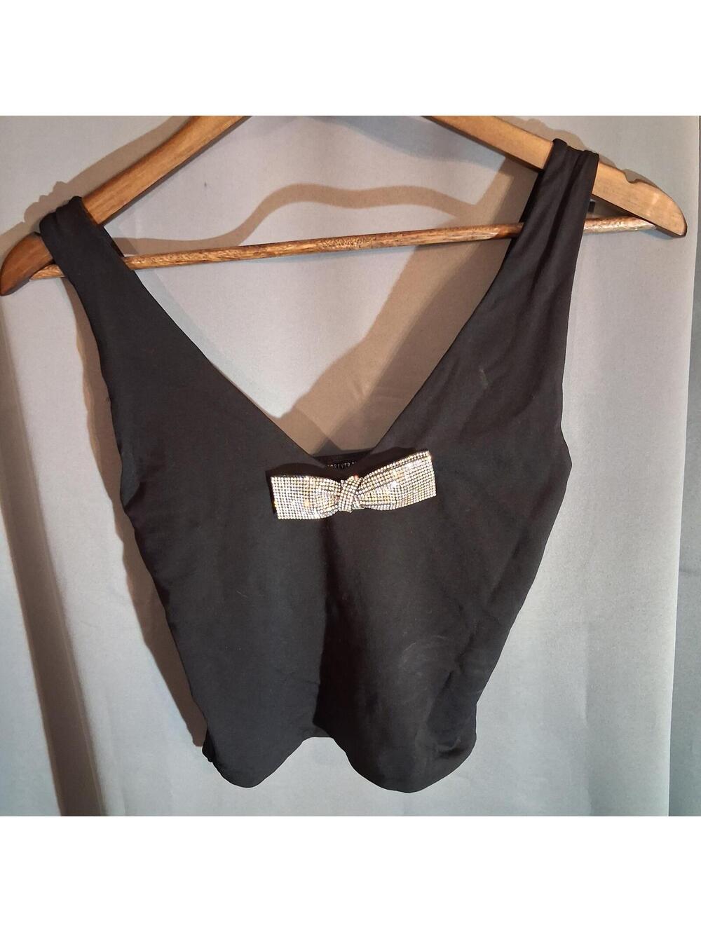Black Sleeveless Top with Rhinestone Bow Accent